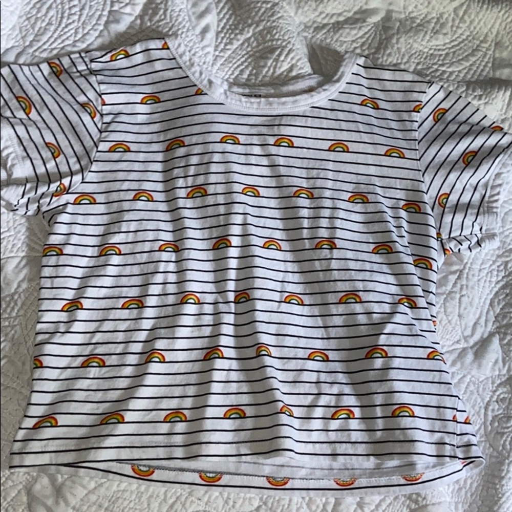 White shirt with black stripes and rainbows